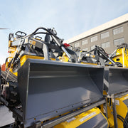 skid_steer_ATSPower_T460_yellow_warehouse_front view